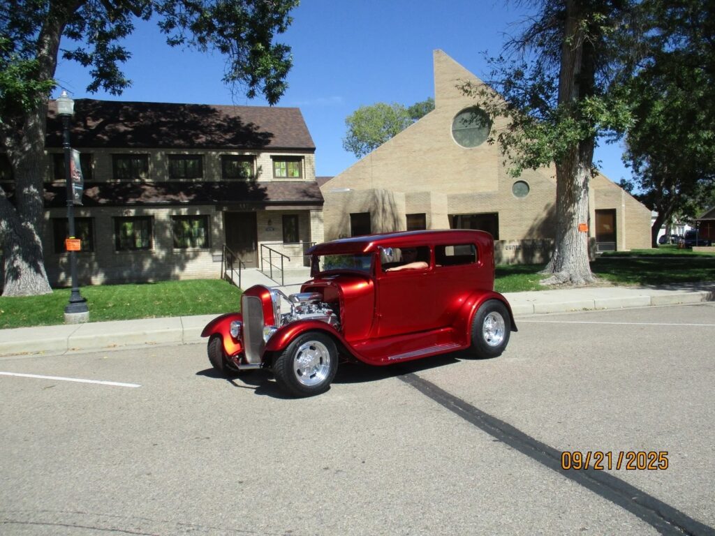 Classic red hot rod at the Fall Harvest Car Show in Fort Morgan, Colorado